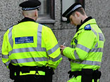 British Police with prominent reflective jackets