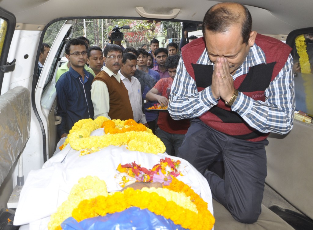 Journalists paying floral tribute on the mortal remains of Senior journalist and Dramatist, Deepak Mahanta at Guwahati Press Club on Thursday. Deepak Mahanta died in a road accident at Jagirod while coming from Tezpur on Wednesday Midnight.